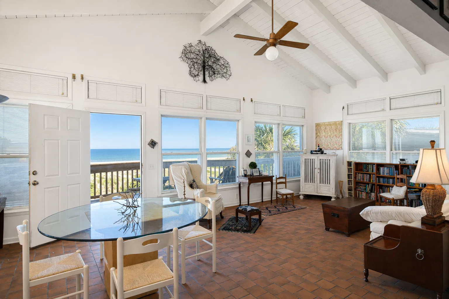 Listing-ready sunroom photo with the view restored